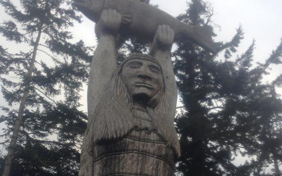 A totem called "Ko-kual-alwoot" ("Maiden of the Sea"), carved by a Swinomish tribal member, stands near Deception Pass at Rosario Beach on the coast of Puget Sound, a few miles from the Suquamish Reservation. (Courtesy of The Cedar Tree Institute)