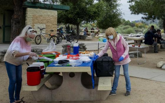 Mater Dolorosa volunteers prepare to serve people experiencing homelessness in Lario Park in Azusa, California. (Michael Cunningham, OSF)