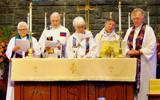 From left: Merrill Bittner, Emily Hewitt, Carter Heyward, Nancy Wittig and Marie Moorefield Fleischer preside at a memorial service for Alison Cheek Nov. 2 at St. Philip’s Episcopal Church in Brevard, North Carolina. (Darlene O’Dell)