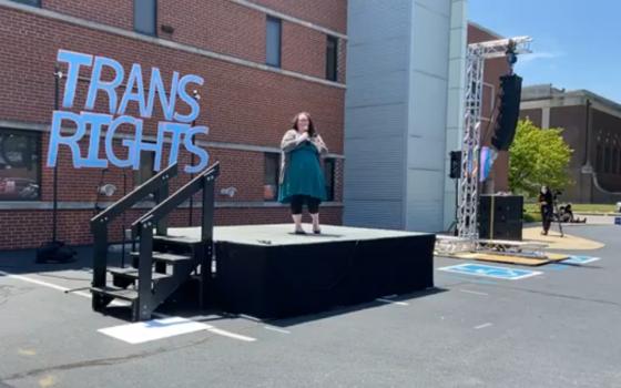 Meli Barber, vice president of DignityUSA, opens the July 11 Rally for Equality Caravan in Indianapolis. (Screenshot from Facebook/Shelly's Voice)