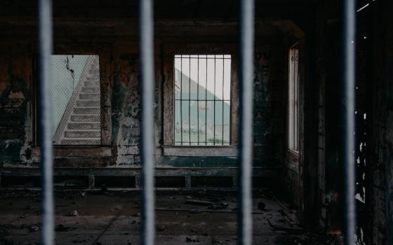 View of prison bars (Unsplash/Christina Boemio)