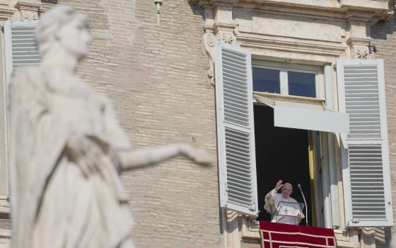 Pope Francis delivers the Angelus noon prayer from his studio window overlooking St. Peter's Square at the Vatican, Sunday, Feb. 6, 2022. (AP Photo/Gregorio Borgia)