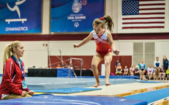 Frannie Ronan of Kirkland, Washington, competes in a gymnastics event July 4 during the Special Olympics USA Games in Seattle. (Special Olympics USA Games/Anne Todd Photography)