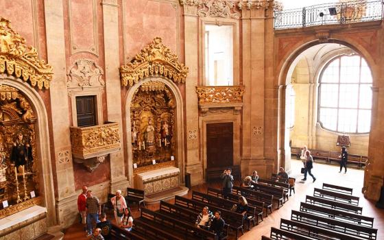 People are seen in Igreja dos Clérigos ("Church of the Clergy") in Porto, Portugal, in January 2019. (Dreamstime/Ksenija2015)