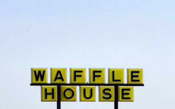 Waffle House sign (Unsplash/Nikhil Mistry)