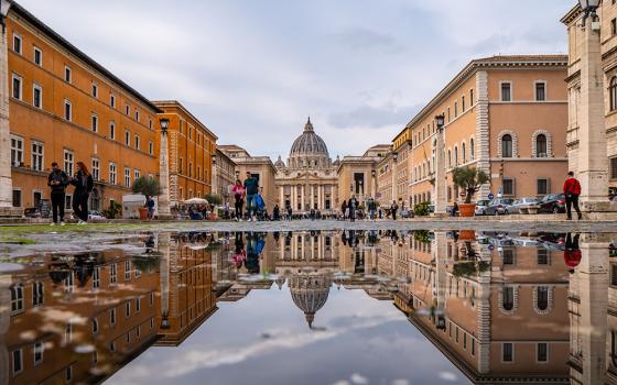 St. Peter's Basilica at the Vatican is seen from a street in Rome. (Unsplash/Shai Pal)