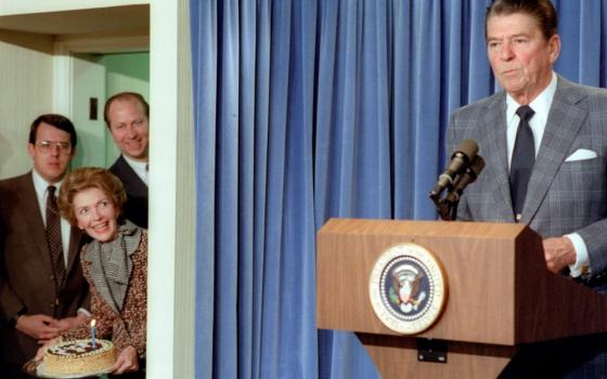 President Ronald Reagan speaks at a press briefing Feb. 4, 1983, when a surprise party was held in honor of his 71st birthday. (CNN Press Room)