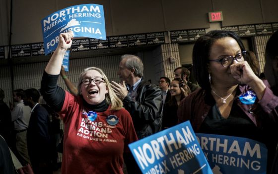 Constituents at the official Democratic watch party at George Mason University in Fairfax, Virginia, react to the news that Ralph Northam won the governor's race against Republican Ed Gillespie Nov. 7. (Newscom/UPI/Pete Marovich)