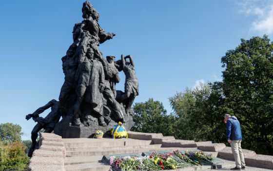 A man prays during a commemoration ceremony for the victims of a massacre of Jews during the Nazi Holocaust at Babi Yar in Kyiv, Ukraine, in this Sept. 29, 2021, file photo. (CNS/Reuters/Valentyn Ogirenko)