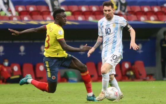 D. Sanchez of Colombia, left, and Lionel Messi of Argentina during the Copa América 2021 July 6 semi-final football match between Argentina and Colombia at Estadio Nacional Mane Garrincha in Brasilia, Brazil. (Newscom/ZUMA Press/Panoramic)  