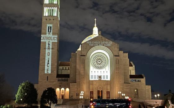 Messages voicing support for abortion rights are projected onto the Basilica of the National Shrine of the Immaculate Conception in Washington, D.C., Thursday, Jan. 20, 2021. (RNS photo by Jack Jenkins)