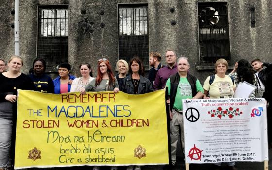 Survivors and their supporters demonstrate on Aug. 25, 2017, at a near-derelict former Magdalene laundry in Dublin. (Newscom/ZUMA Press/Ed Carty)