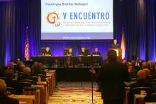 San Antonio Archbishop Gustavo García-Siller, at podium, listens to a question as he gives a report on V Encuentro at the 2018 fall general assembly of the U.S. Conference of Catholic Bishops in Baltimore. (CNS/Bob Roller)