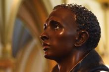 A statue of St. Martin de Porres stands at the entrance of St. Augustine Church in Washington, D.C. (CNS/Elizabeth Bachmann)