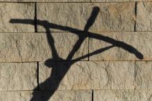 Shadow of a crucifix (CNS/KNA/Harald Oppitz)