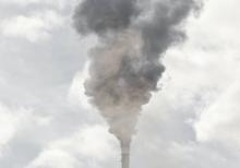 Smoke billows from a tower at the Holly Refining Co. petroleum refinery in Woods Cross, Utah in this 2018 photo. (Unsplash/Patrick Hendry)