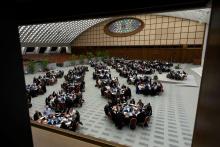 An overview of room with round tables