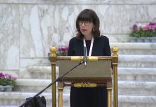 Anna Rowlands, a professor of Catholic social thought and practice at Durham University in England, gives a theological reflection as the assembly of the Synod of Bishops begins work on its section section, communion, in this screengrab from Oct. 9, 2023, in the Vatican's Paul VI Audience Hall. (CNS/YouTube/Vatican Media)