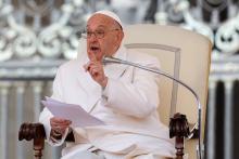 Pope Francis speaks to members of the Italian Catholic Action lay association gathered in St. Peter's Square during a meeting at the Vatican April 25, 2024. (CNS/Lola Gomez)