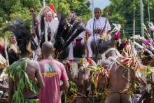 Pope Francis, with the Bishop of Vanimo Francis Meli, right, attends a meeting with faithful in Vanimo, Papua New Guinea, Sunday, Sept. 8, 2024. Pope Francis celebrated the Catholic Church of the peripheries on Sunday as he traveled to the remote jungles of Papua New Guinea, bringing with him a ton of medicine and toys and a message of love overcoming violence for the people who live there.(AP Photo/Gregorio Borgia)