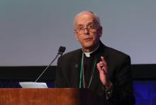 Bishop Mark Seitz of El Paso, Texas, speaks during a Nov. 13 session of the fall general assembly of the U.S. Conference of Catholic Bishops in Baltimore. Seitz, the bishops' migration chair, said the U.S. church will try to reshape the national narrative on migration to one that is more welcoming. (OSV News/Bob Roller)