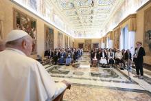 Pope Francis listens as he meets women participating in or assisting the Synod of Bishops in the Apostolic Palace at the Vatican Oct. 19, 2024. (CNS/Vatican Media)