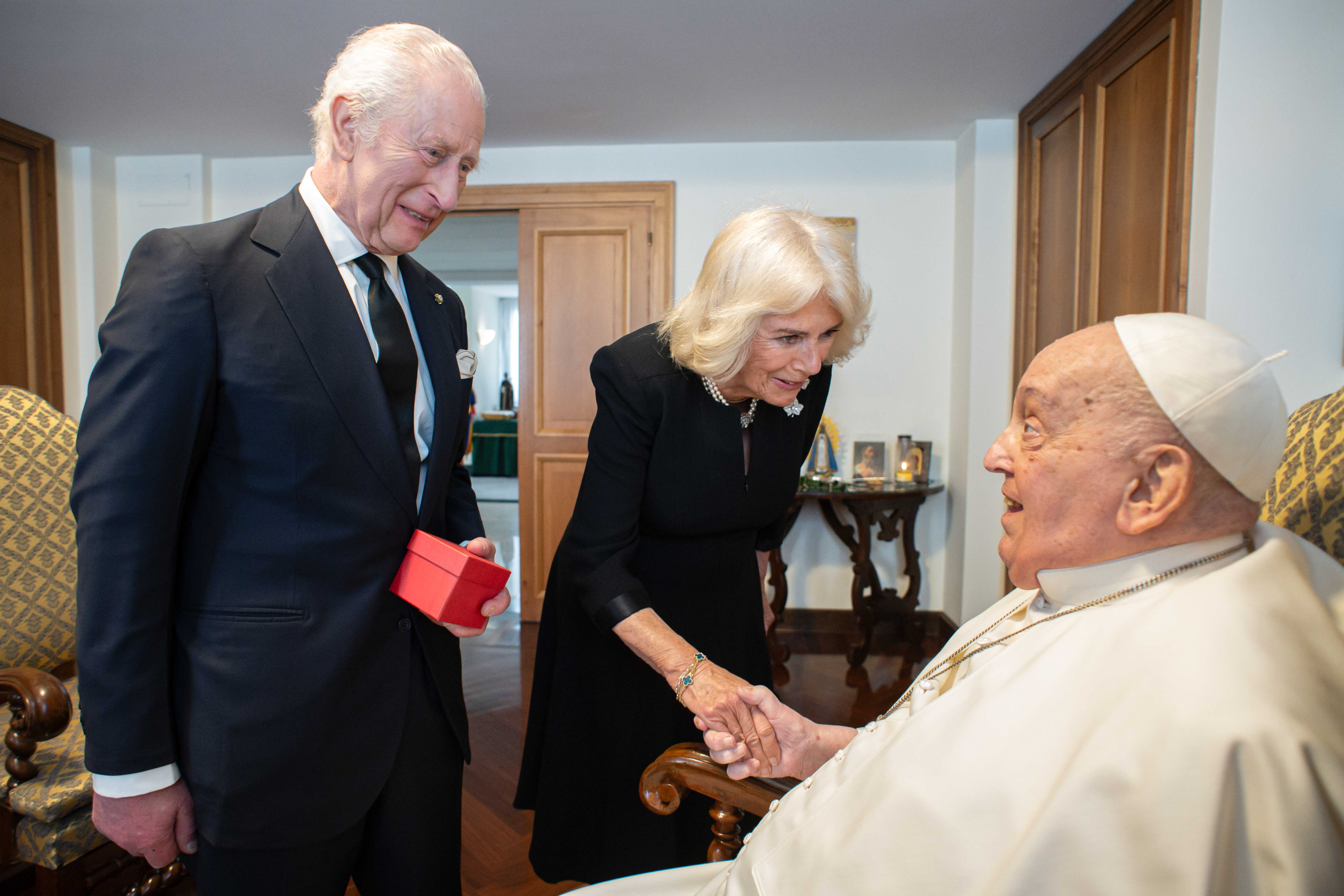 Britain’s King Charles III and Queen Camilla greet Pope Francis during a visit at the Vatican April 9, 2025. (CNS photo/Vatican Media)