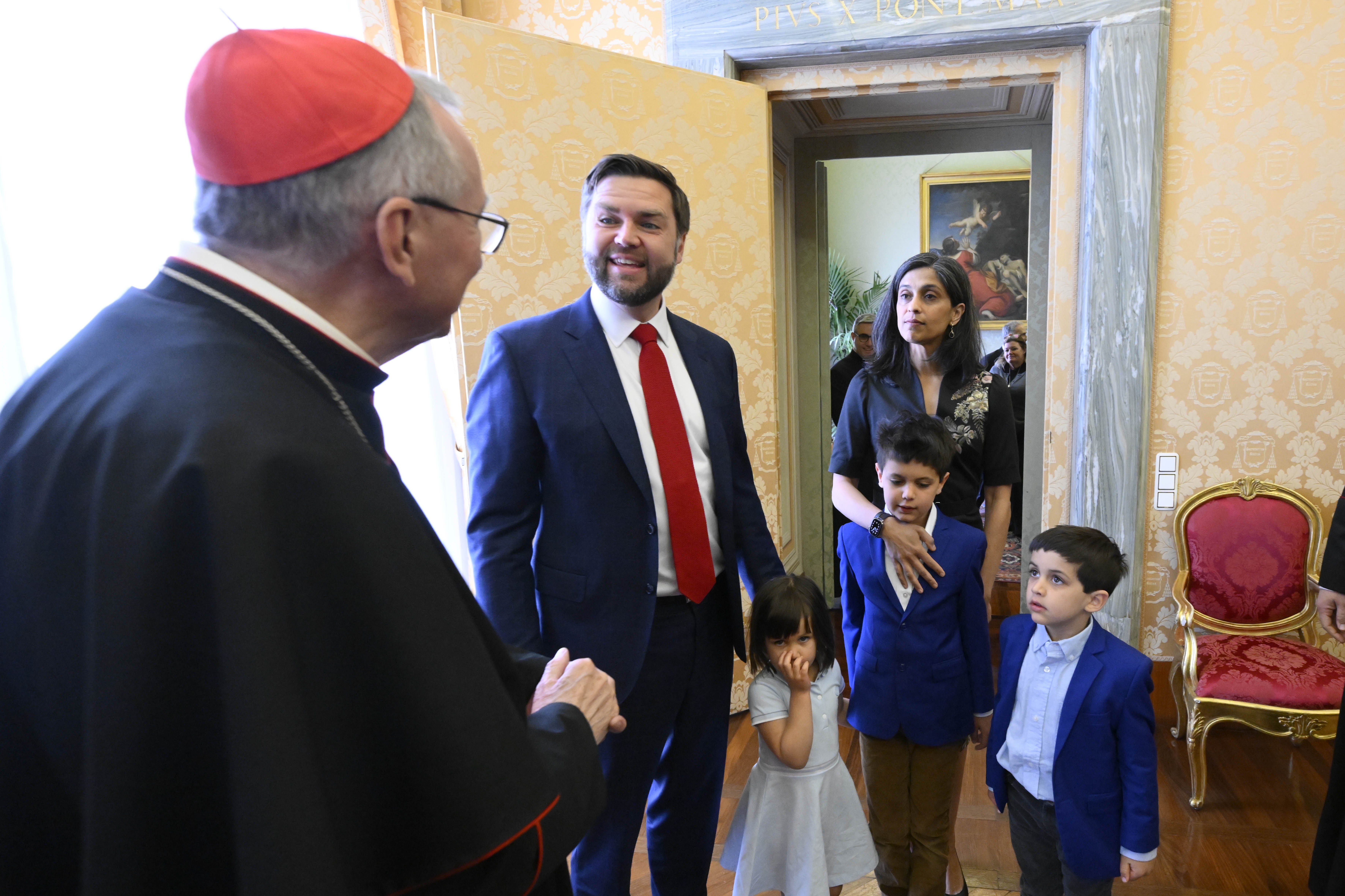Cardinal Pietro Parolin, Vatican secretary of state, greets U.S. Vice President JD Vance with his wife, Usha, and children before a meeting in the Apostolic Palace at the Vatican 