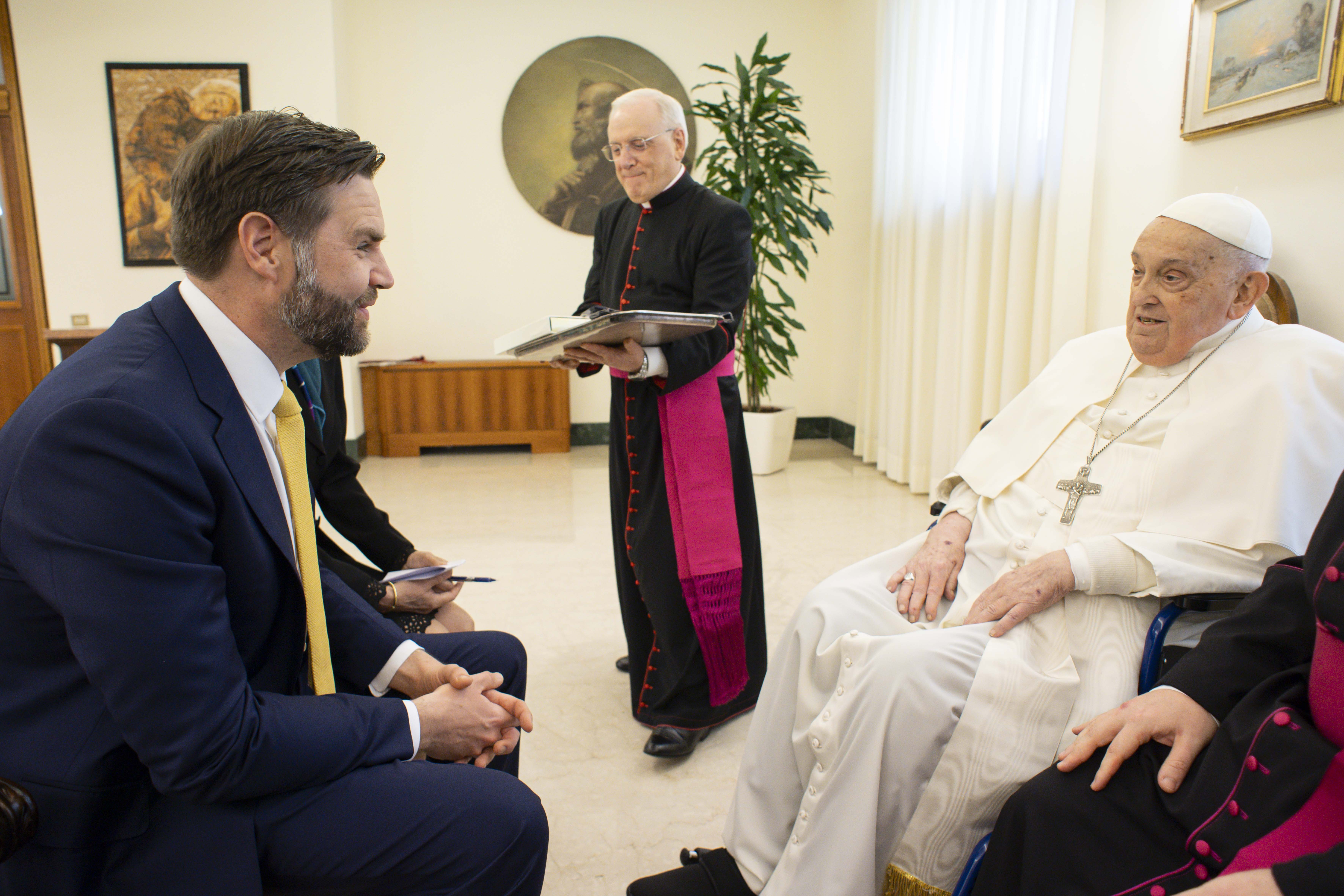 Pope Francis meets briefly with U.S. Vice President JD Vance, and his translator, in the papal residence, the Domus Sanctae Marthae, at the Vatican April 20, 2025. The Vatican said the meeting was an opportunity to exchange best wishes for Easter. (CNS photo/Vatican Media)