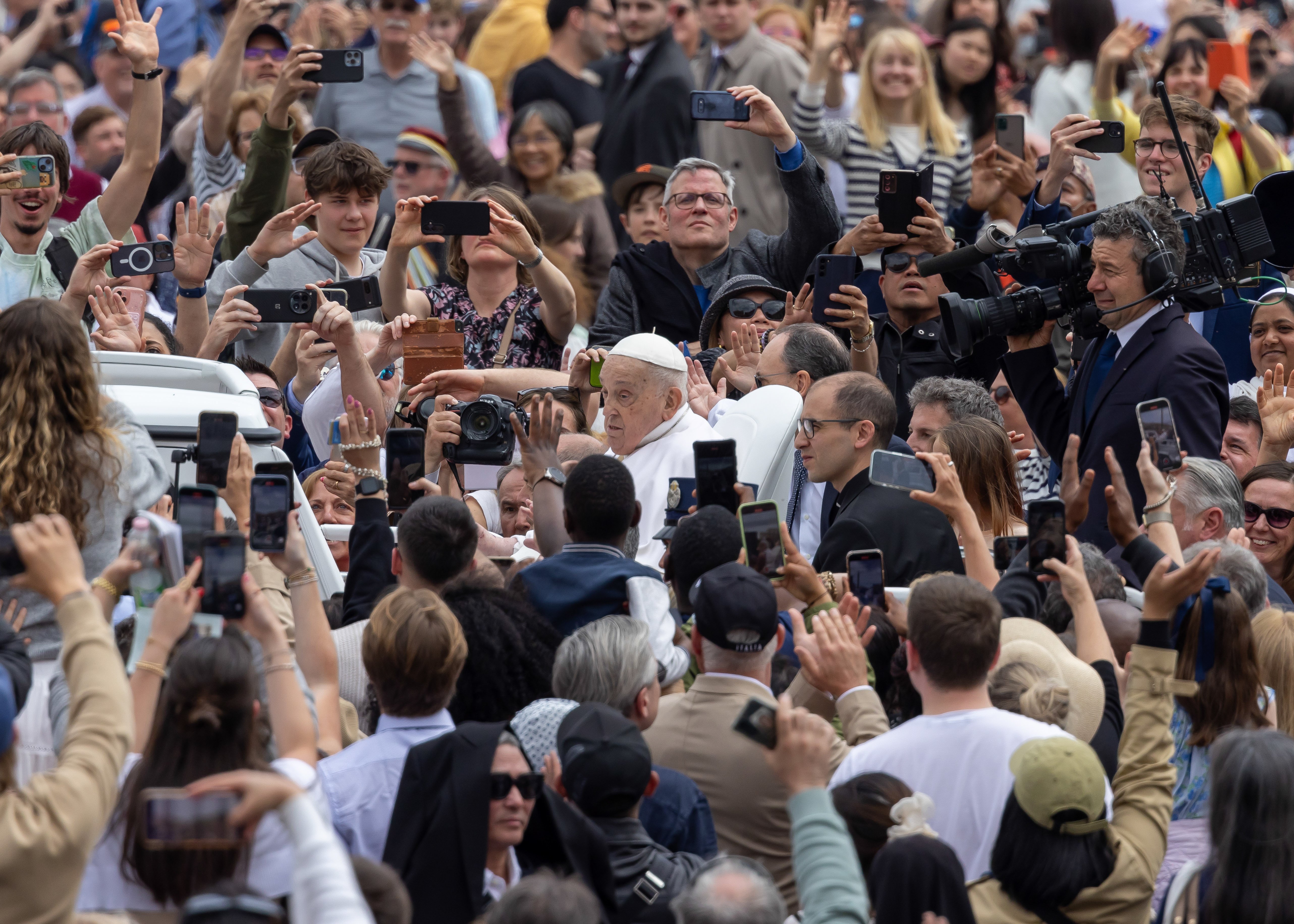 Pope Francis, in the popemobile, greets people in St. Peter's Square at the Vatican after giving his Easter blessing April 20, 2025. (CNS photo/Pablo Esparza)