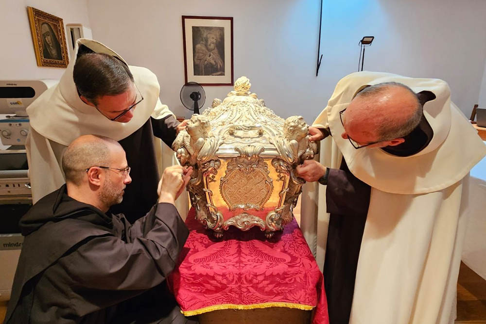 The silver urn containing the body of St. Teresa of Ávila in Alba de Tormes, Spain, is opened for the first time since 1914 and marked the beginning of a study of her relics, which was carried out by Italian doctors and scientists with Vatican approval. (OSV News/courtesy Order of Carmel) 