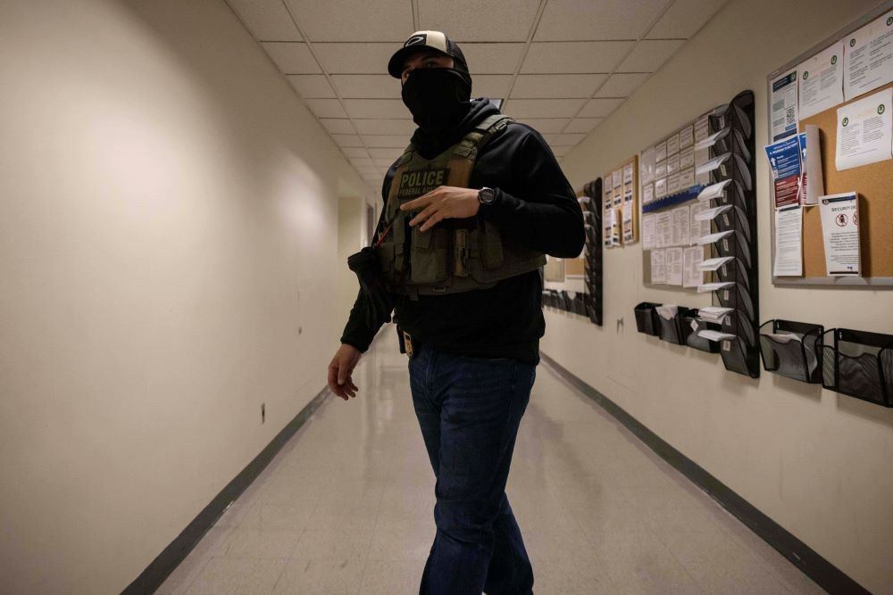 A federal agent walks around at the immigration court at Jacob K. Javits Federal Building in New York. 