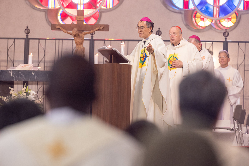 Bishop Alexis Mitsuru Shirahama of Hiroshima, Japan, concelebrates Mass Aug. 6, 2025, at the World Peace Memorial Cathedral in Hiroshima for the victims of the atomic bombing. Cardinal Robert McElroy of Washington stands behind him. The Mass was part of a "Pilgrimage of Peace" by four U.S. archbishops and U.S. Catholic university leaders and students to Hiroshima and Nagasaki to pray and dialogue for peace on the 80th anniversary of when the atomic bombs were dropped on those cities on Aug. 6 and 9, 1945. (