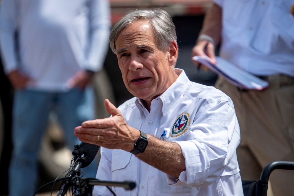 Greg Abbott speaks to press. 