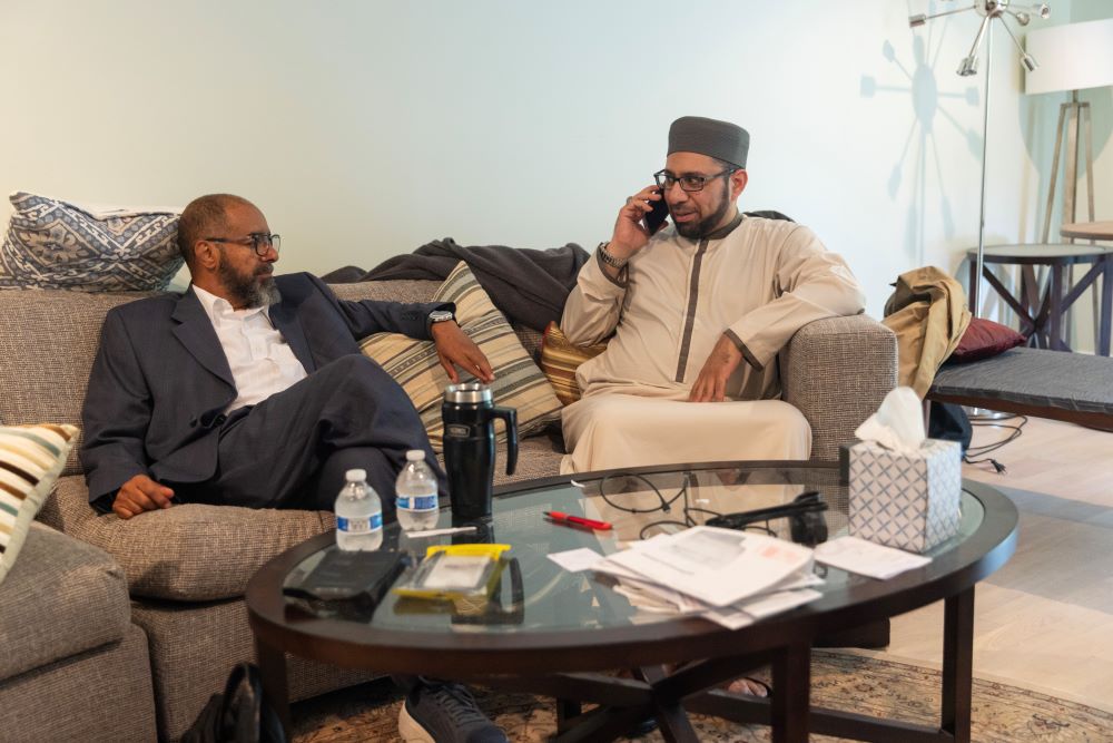 2 men on couch