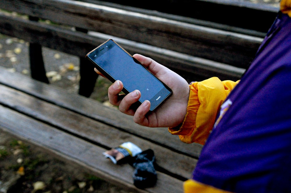 Someone holding a phone in their hand
