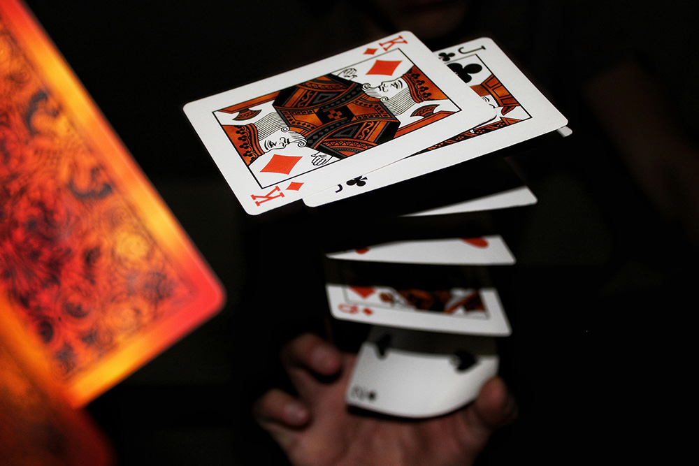 Card magic trick (Unsplash/Kenneth Berrios)