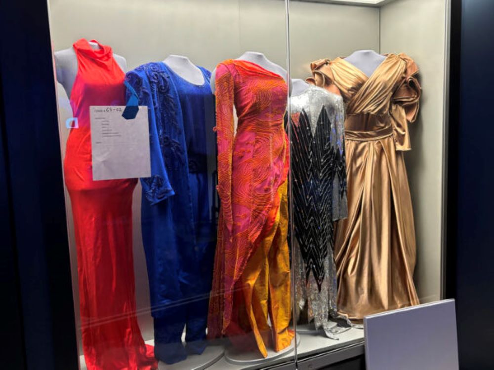 A row of dresses is displayed at the Museum of Christian & Gospel Music in downtown Nashville, Tenn. (RNS/Bob Smietana)