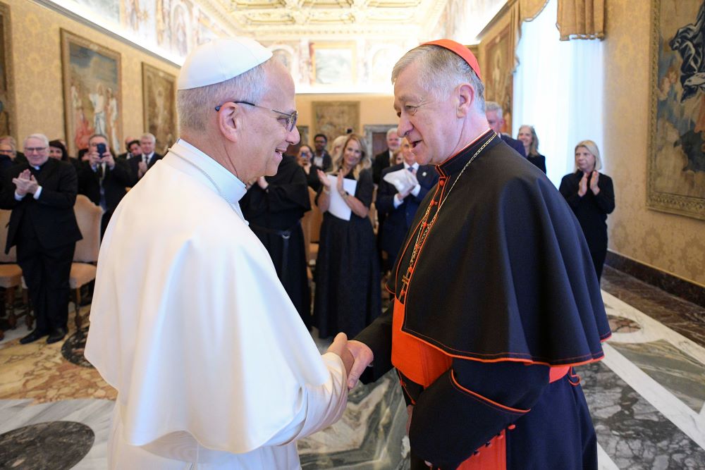 Pope Leo XIV greets Cardinal Blase Cupich of Chicago during an audience at the Vatican Oct. 9 with a pilgrimage of labor union leaders from Chicago. (CNS/Vatican Media)