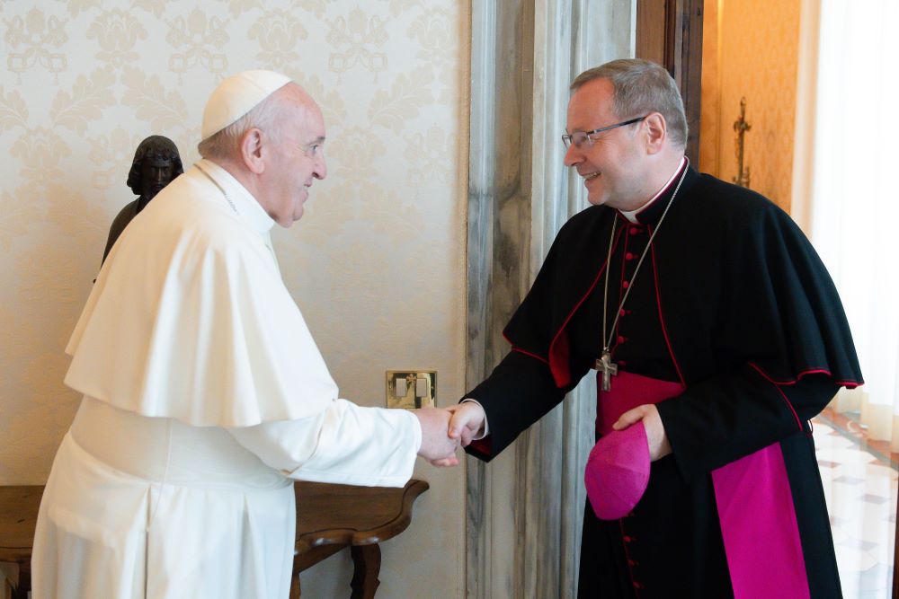 Pope Francis greets Bishop Georg Batzing.