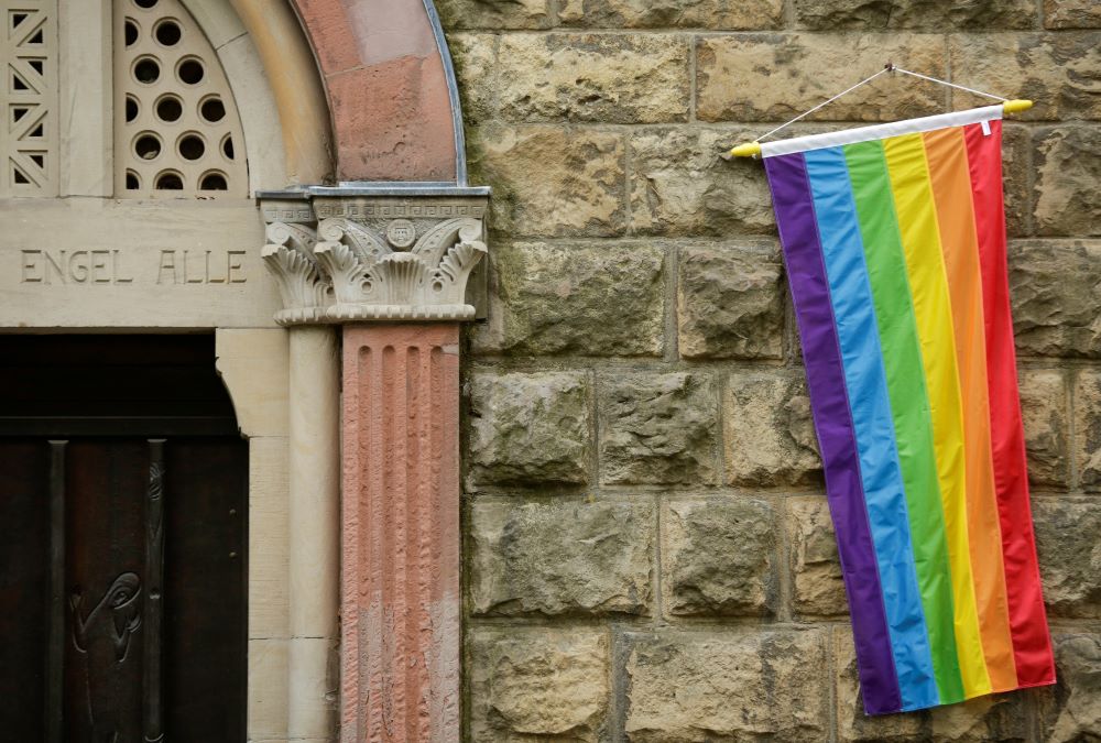 A rainbow flag is seen on the wall of a Catholic church in Cologne, Germany. 