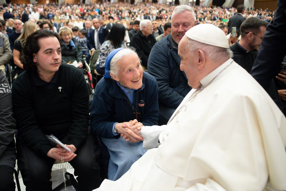 Sr. Geneviève Jeanningros greets Pope Francis.