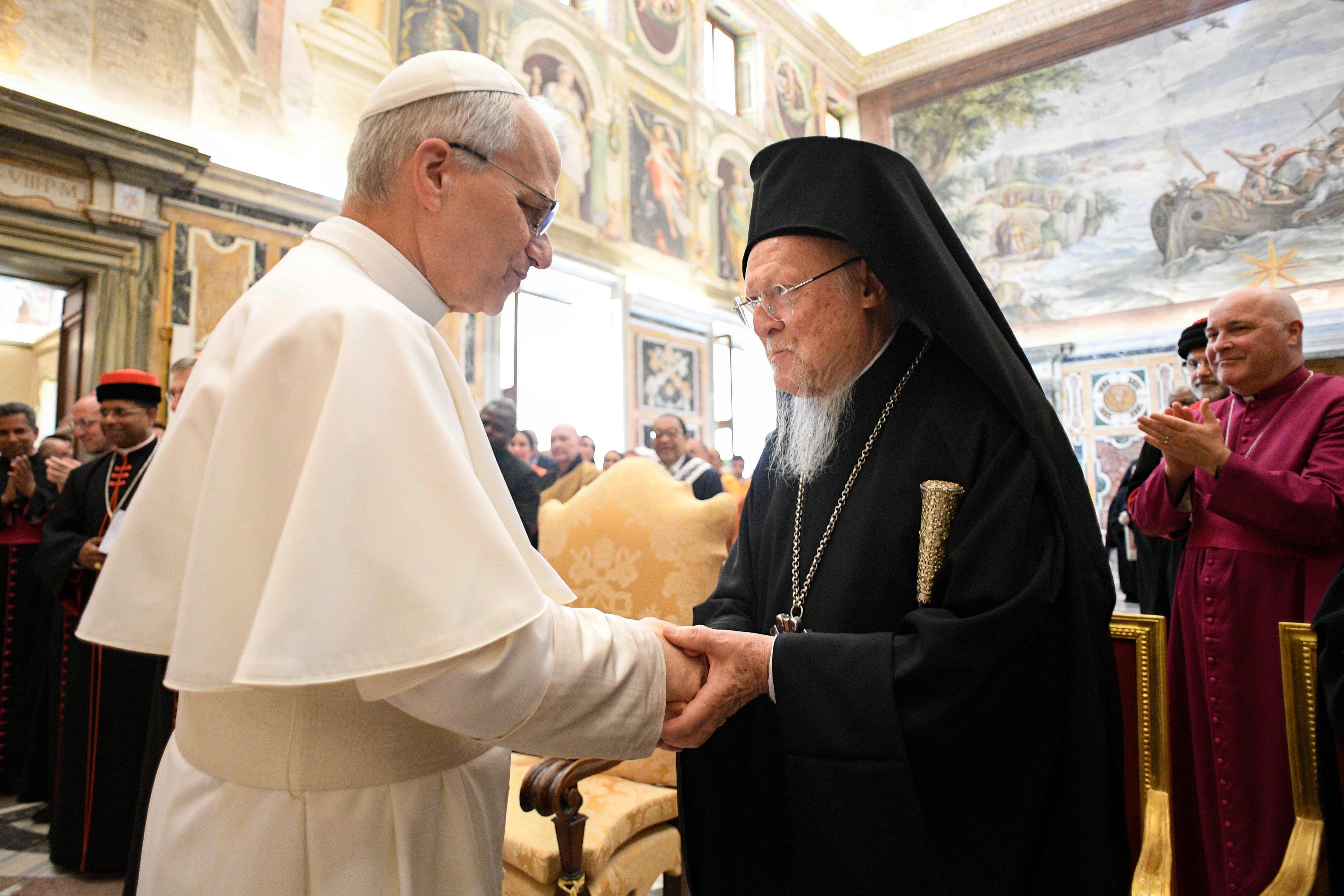 Pope Leo XIV greets Orthodox Ecumenical Patriarch Bartholomew of Constantinople during a meeting with religious leaders at the Vatican, May 19, 2025. The leaders had come to Rome for the pope's inauguration Mass. (CNS photo/Vatican Media)