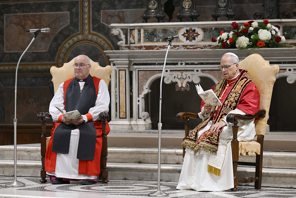 Pope Leo XIV and Anglican Archbishop Stephen Cottrell of York, England, left, lead midday prayer with Britain's King Charles III and Queen Camilla in the Sistine Chapel at the Vatican Oct. 23, 2025. (CNS/Vatican Media)