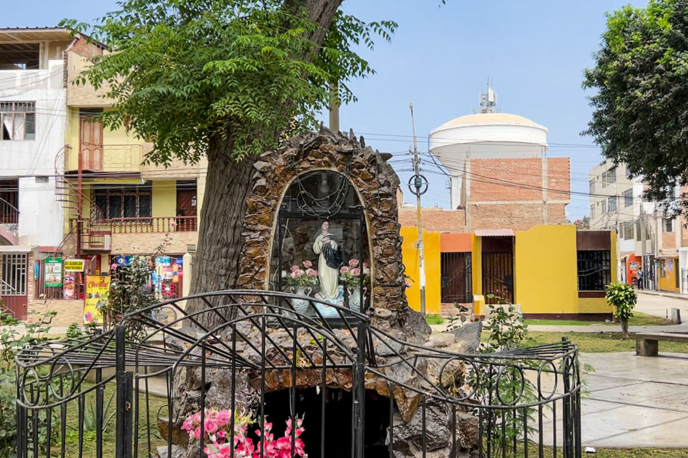 A statue depicting the Immaculate Conception marks the "Inmaculada" neighborhood of Our Lady of Montserrat Parish in Trujillo, Peru. (NCR photo/Justin McLellan)