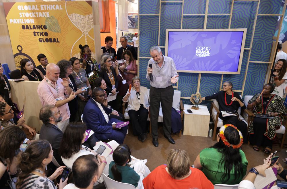 COP 30 President André Corrêa do Lago, center, speaks.