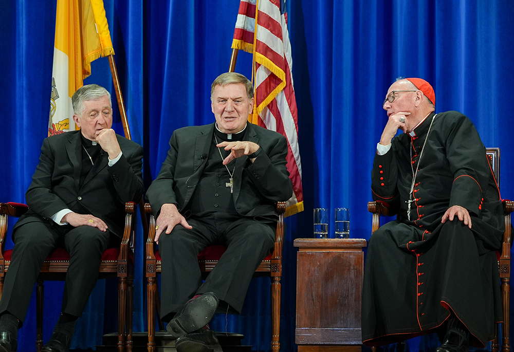 Cardinal Joseph W. Tobin of Newark, New Jersey, speaks during a news conference with U.S. cardinals at the Pontifical North American College in Rome May 9, 2025, as Cardinal Blase J. Cupich of Chicago, left, and Cardinal Timothy M. Dolan of New York, right, listen. The cardinals reflected on the conclave and the election of Pope Leo XIV. (CNS/Lola Gomez)