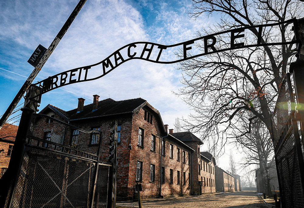 The gate that reads "Arbeit macht frei" ("Work makes you free") is seen Jan. 27, 2025, at the Nazi German Auschwitz-Birkenau concentration and extermination camp in Oswiecim, Poland. In an Oct. 31, 2025, statement, Bishop Timothy C. Senior of Harrisburg, Pennsylvania., apologized for a replica of the Auschwitz gate that appeared on a float presented by St. Joseph Catholic School in Hanover at the town's Halloween parade. (OSV News/Reuters/Grzegorz Celejewski)
