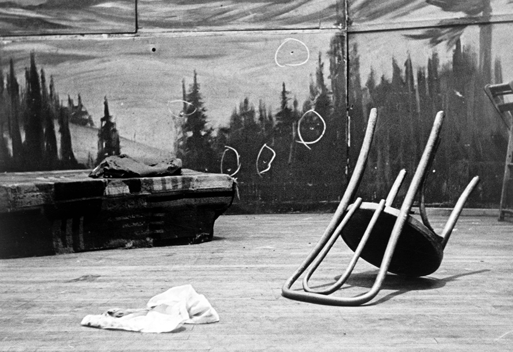 Bullet holes at the back of the stage where Malcolm X was shot are shown in a news photo from 1965. (Library of Congress/World Telegram & Sun/Stanley Wolfson)
