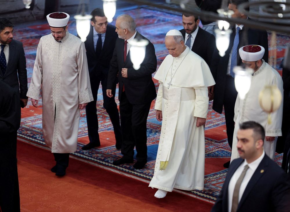 Pope Leo XIV visits the Sultanahmet Mosque, known as the Blue Mosque, during his first apostolic journey, in Istanbul, Turkey, Nov. 29. (OSV News/Reuters/Umit Bektas)